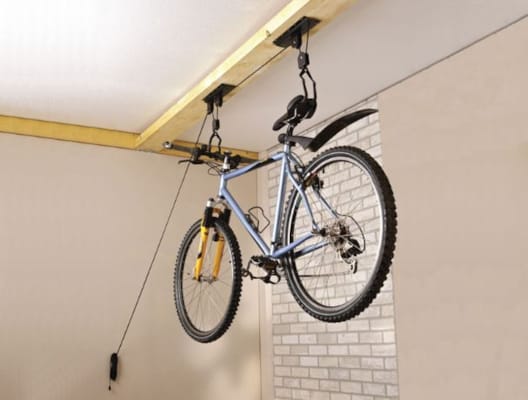 Système de suspension pour vélo avec poulie